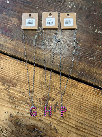 Pink initial necklaces