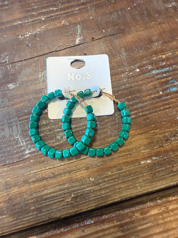 Green hoop earrings