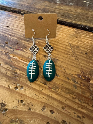 Clay football dangle earrings